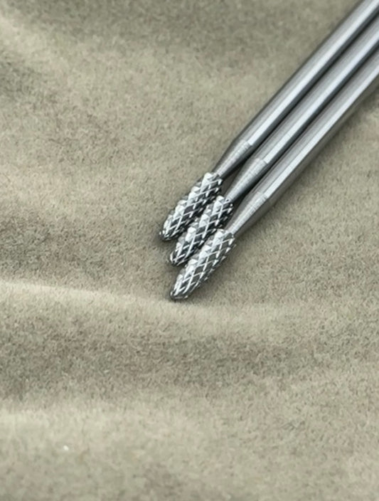 Carbide nails drill bit